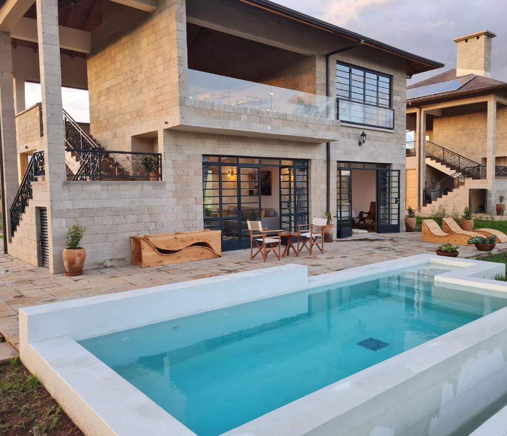 The Landing Nanyuki Cottages Exteriör bild